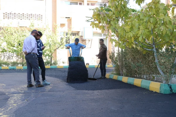 اجرای پروژه آسفالت محوطه پردیس بنت الهدی صدر قزوین 2