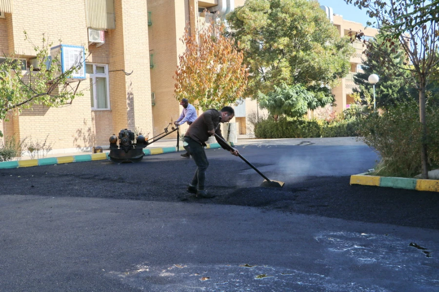 اجرای پروژه آسفالت محوطه پردیس بنت الهدی صدر قزوین 5
