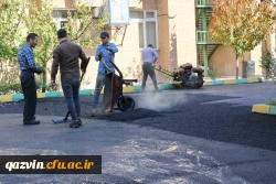 اجرای پروژه آسفالت محوطه پردیس بنت الهدی صدر قزوین 6