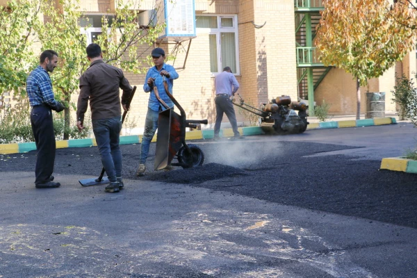 اجرای پروژه آسفالت محوطه پردیس بنت الهدی صدر قزوین 6