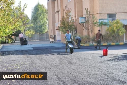 اجرای پروژه آسفالت محوطه پردیس بنت الهدی صدر قزوین 7