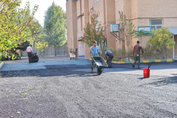 اجرای پروژه آسفالت محوطه پردیس بنت الهدی صدر قزوین 7