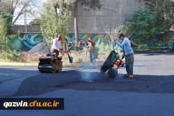 اجرای پروژه آسفالت محوطه پردیس بنت الهدی صدر قزوین 9